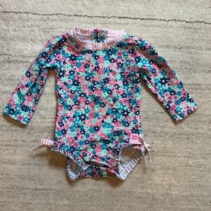 Ruffle butts floral swimsuit. Size 6-12 months
